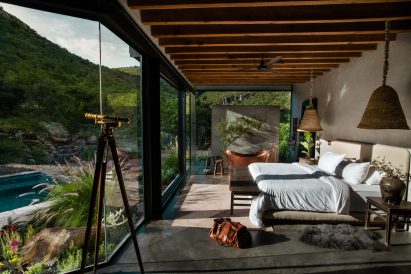 Bedroom of mirrored cabin designed by Prashant Ashoka