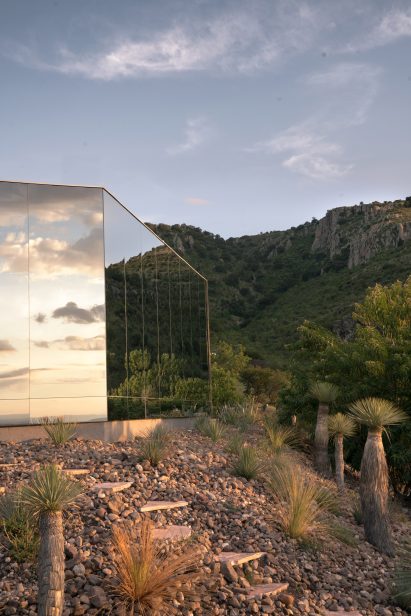 Mirrored off-grid cabin in Ecuador