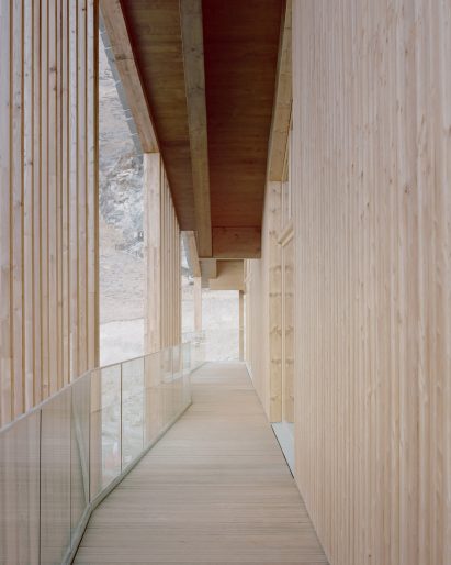 A timber terrace of an Italian mountain chalet