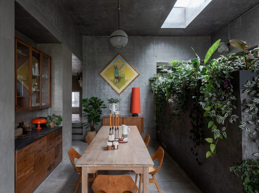 A dining area inside Concrete House by RAW Architecture Workshop in East Sussex