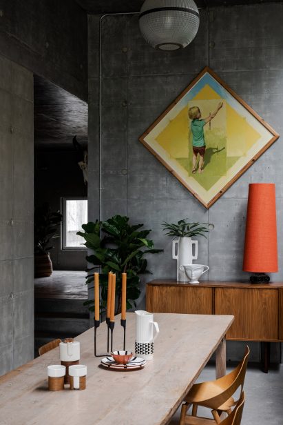 A dining area inside Concrete House by RAW Architecture Workshop in East Sussex