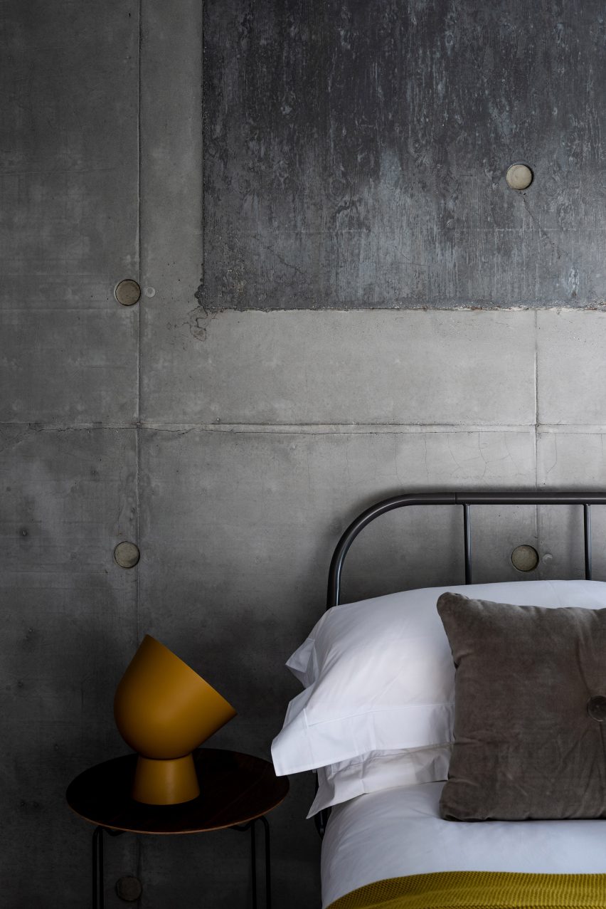 A bedroom of Concrete House by RAW Architecture Workshop in East Sussex