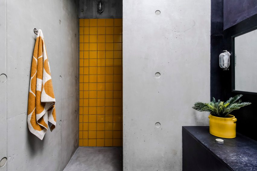 A bathroom in Concrete House by RAW Architecture Workshop in East Sussex