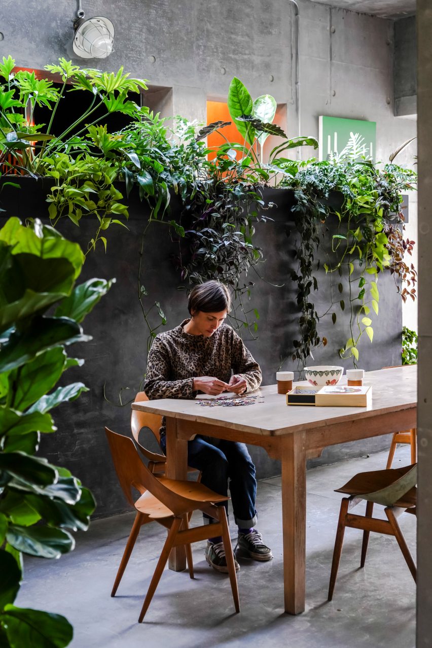 A dining area in Concrete House by RAW Architecture Workshop in East Sussex