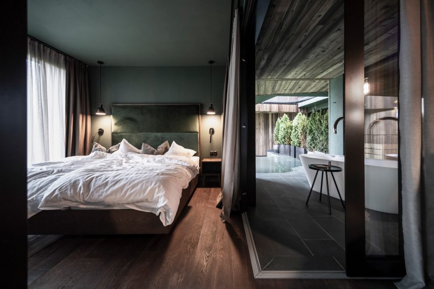 A bedroom inside the Floris hotel extension by NOA