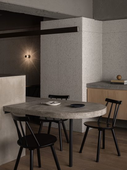 Steel overhead lamp in Grillno restaurant by Keiji Ashizawa