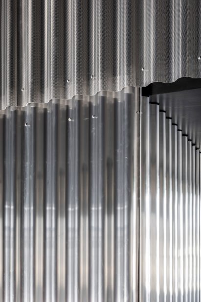 Corrugated aluminium-clad walls