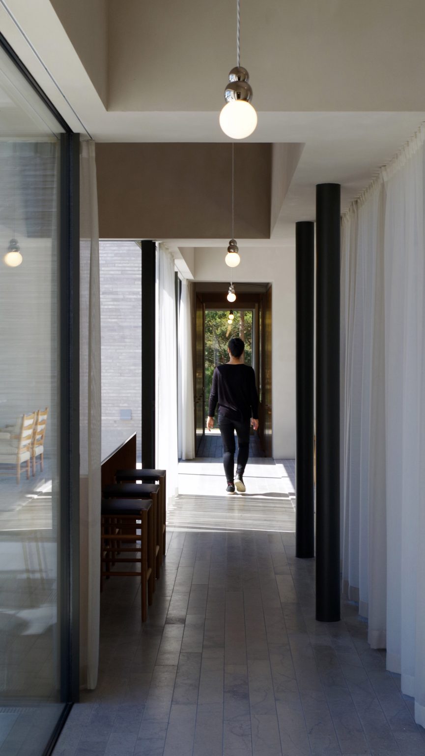A corridor inside the House of Many Courtyards by Claesson Koivisto Rune