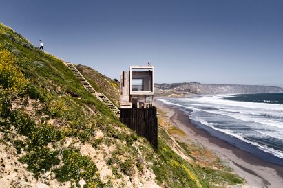 Windows overlooking Pacific Ocean in Chilean cabin