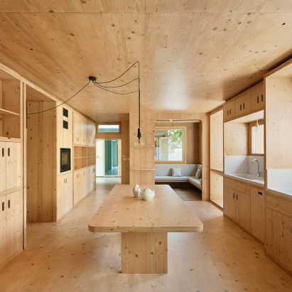 Aixopluc completes cork and cross-laminated timber extension to traditional Catalan house