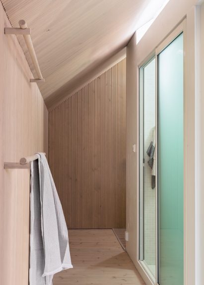 The light-wood interiors of a woodland cabin in Finland