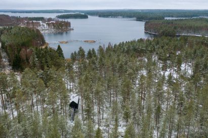 An aerial view of Studio Puisto's woodland cabin in Finland