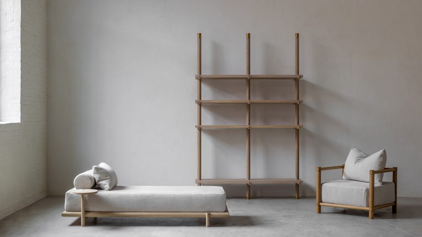 Oak daybed, library and armchair in Nomad furniture by Nathalie Deboel