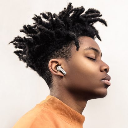 The Olive Pro earbuds by Olive Union in use