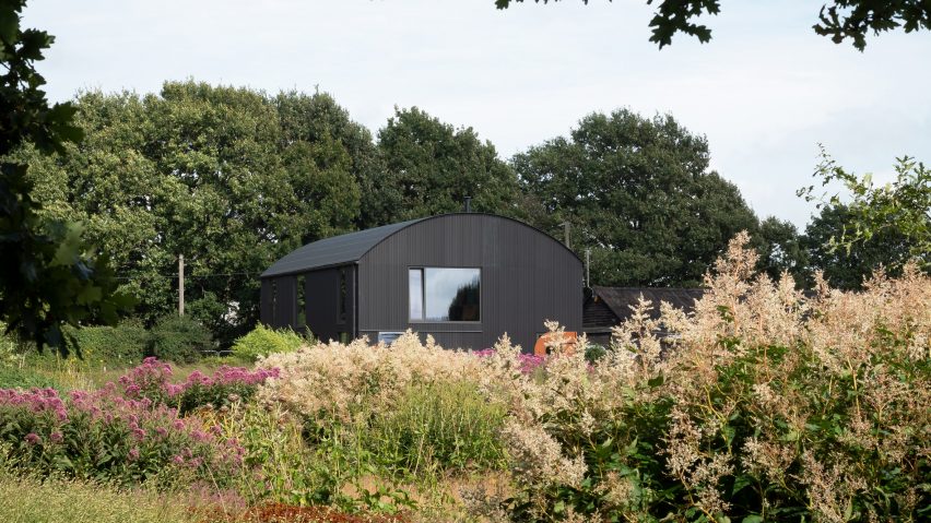 Barrel-vaulted barn at Morlands Farm in West Sussex by Sandy Rendel Architects