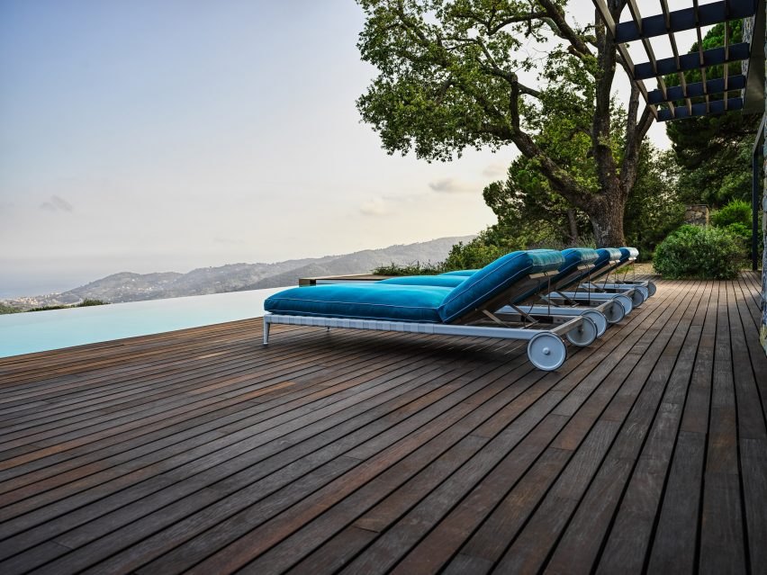 Pool loungers at Villa Nemes by Giordano Hadamik Architects
