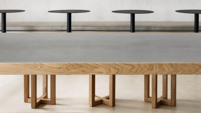 Communal dining table at Zuppa restaurant by Plantea Estudio made from wood and steel
