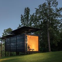Glowing window on 019 Cabin by ŠA Atelier and Piritas