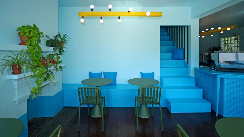 Tipico's seating areas feature olive green garden tables and chairs