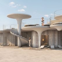 The beach club has sandy concrete canopies