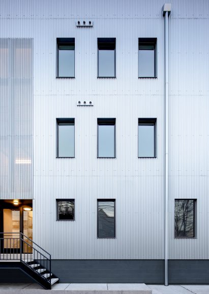 Corrugated metal cladding