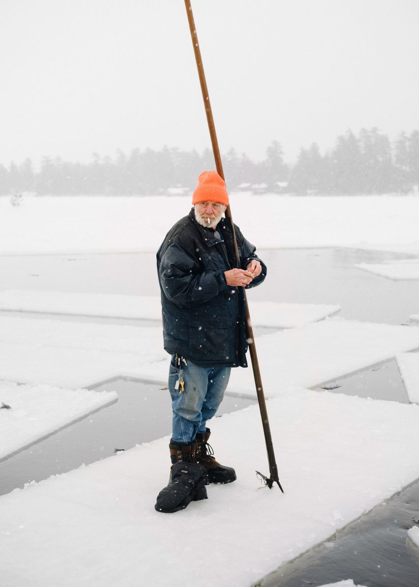 A photograph of a local man explaining the value of ice as a regional material