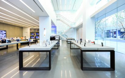 White tables inside Xiaomi flagship store