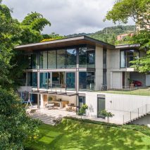 The house is set on a hillside
