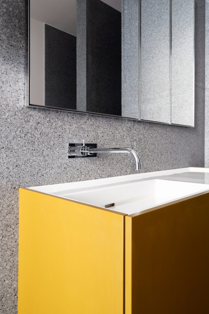 Yellow bathroom cabinetry