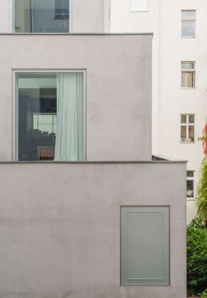 Floor to ceiling windows look out onto terraces