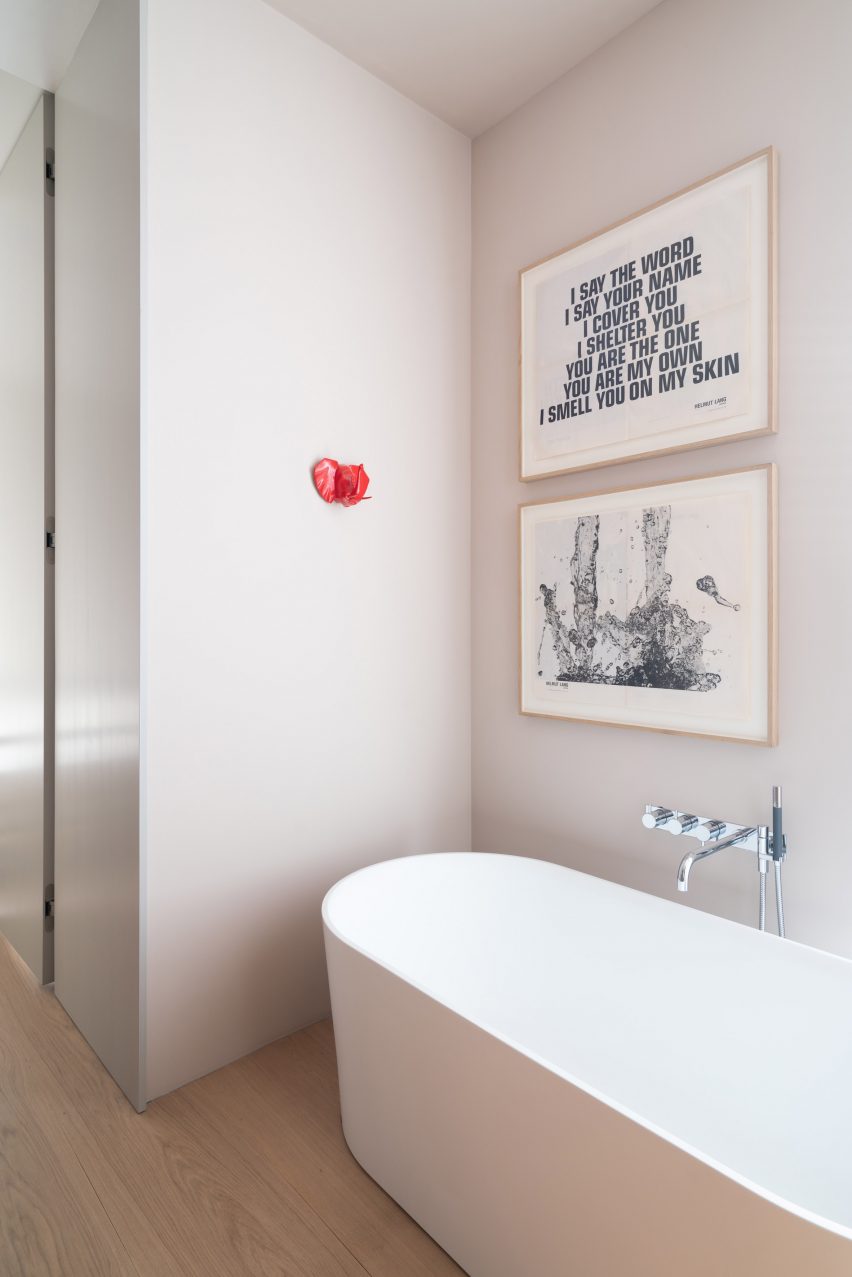 Bathroom is painted a pale pink