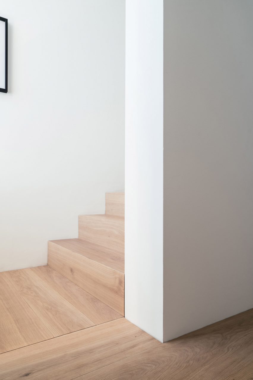 The interior has white walls wooden floors