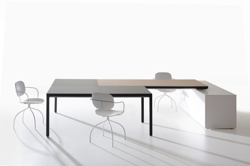 IOC Project Partners workstation with several chairs and a cabinet
