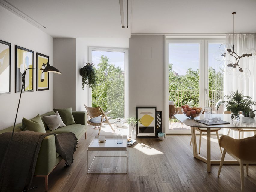 Interior view of an apartment with views out to tree-line