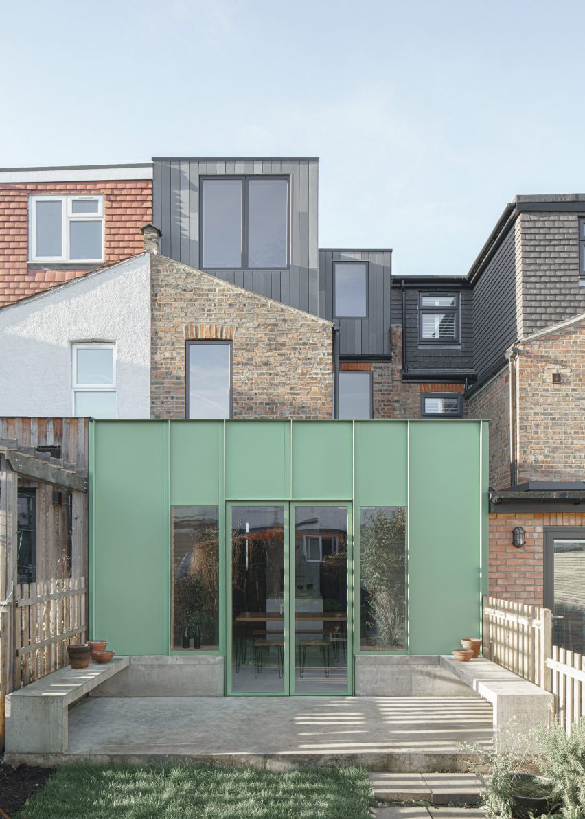 The green aluminium-clad extension of a house in London by DeDraft