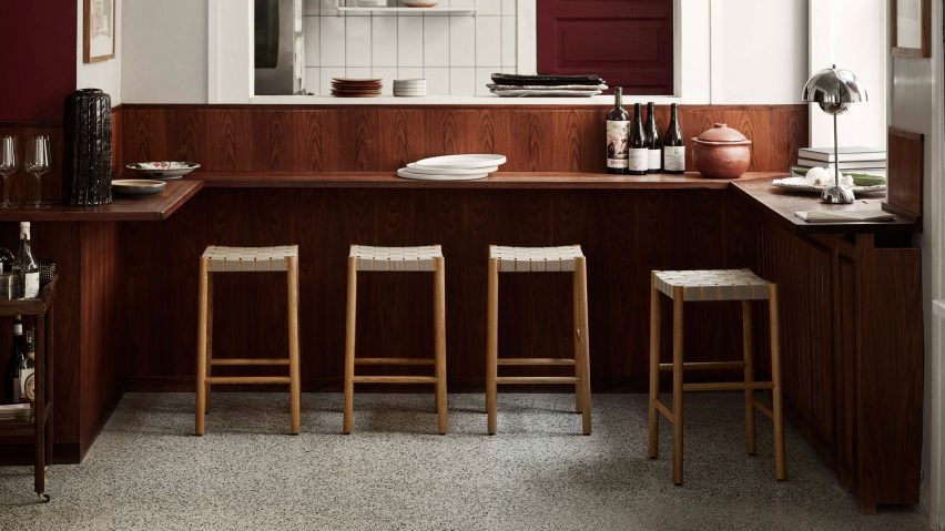 Betty TK8 stool in oak and natural webbing by Thau & Kallio for &Tradition in an restaurant interior
