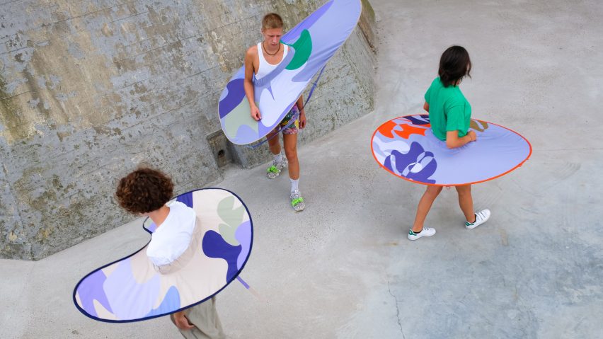 People wearing the unfurled distance keeper from the Bounding Spaces collection by Anna-Sophie Dienemann