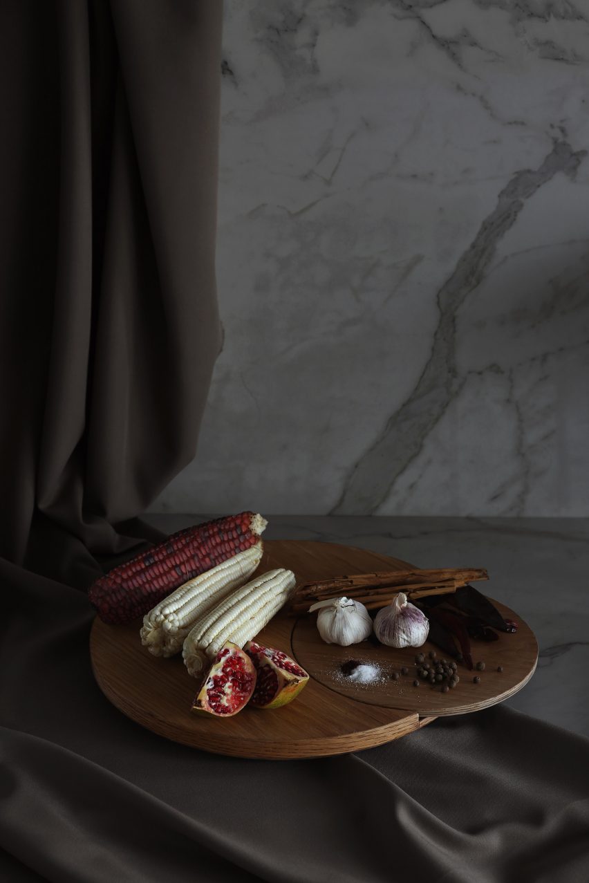 Wooden serving platters with fruit and vegetables atop