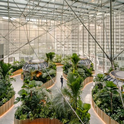 Aerial view of plant-filled Citibank Singapore office with garden pods