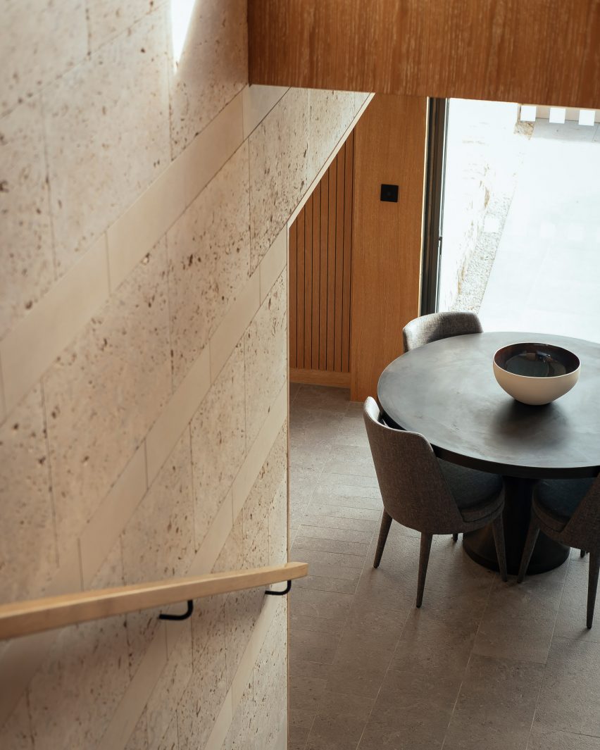 Stone walls are paired with wooden panelling