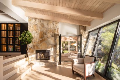 Stone fireplace in lakeside cottage in Canada 