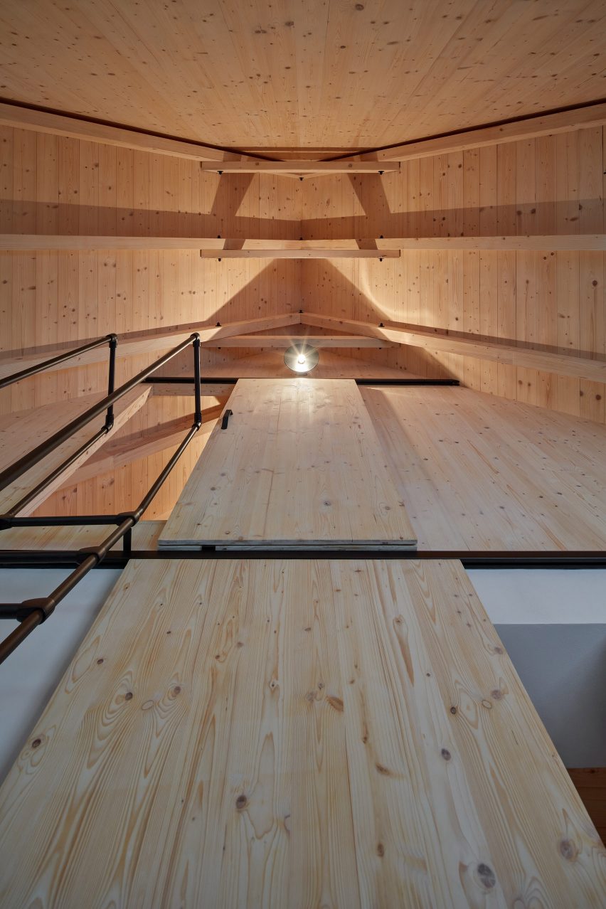Pale wood lines the interior