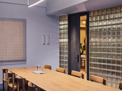 Blue meeting room with glass wall