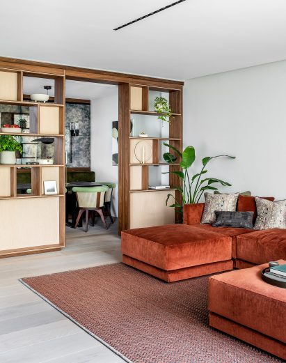 Living room, dining area and storage divider of the Knightsbridge Mews House