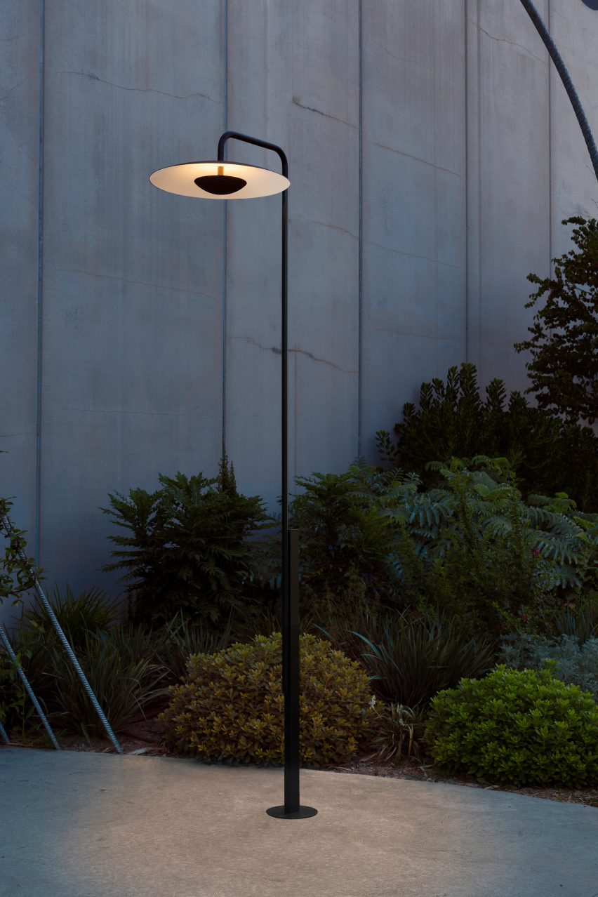 A minimalist black lamppost