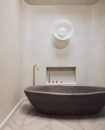 Bath made from sands, unfired clays, pigments and minerals