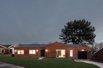 Facade of Honey and Walnut House renovated bungalow by Intervention Architecture