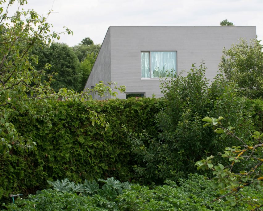 Living space and terrace in House and the River by After Party