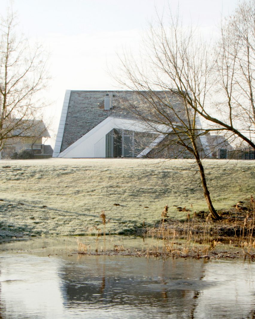 Living space and terrace in House and the River by After Party