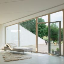 Living space and terrace in House and the River by After Party